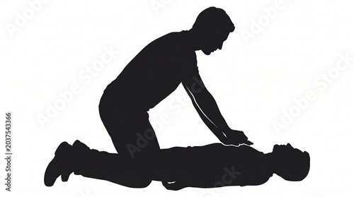 Silhouette of a rescuer performing cpr chest compressions on a patient