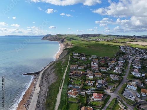 Cuadro en lienzo Houses on cliff edge West Bay Dorset UK pull back drone aerial view