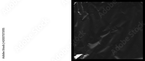 Tableau sur toile Crumpled black plastic texture, wrinkled dark polyethylene film background, glos