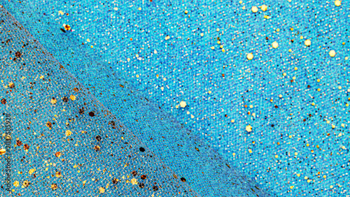 Fotografía Colorful fabric with texture and pattern in blue tones scattered with shiny elem