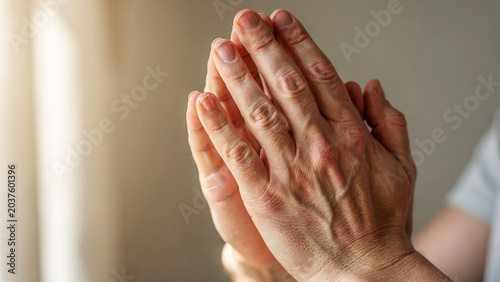 both hands folded closed facing upwards as if wanting to ask, pray, pray, or hope