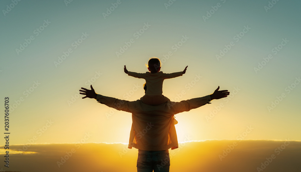 Fototapeta premium Father and Son Silhouette at Sunset.