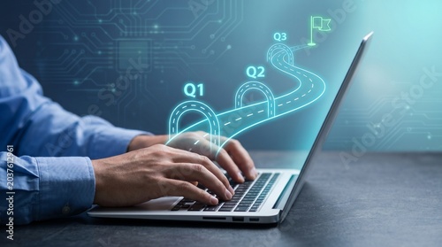 Person typing on laptop with glowing roadmap on screen for business strategy and planning