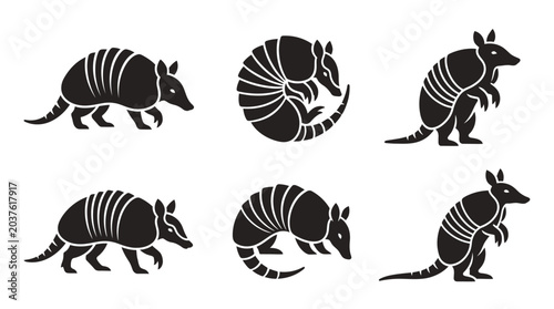 Obraz na plátně different black armadillo silhouettes on a clean white background, minimalist vector style