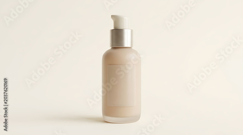 A clean and minimalist studio shot of a bottle of cosmetic foundation with a silver pump dispenser on a neutral background