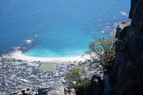 Breathtaking high-angle view of Camps Bay beach, Cape Town, taken from the heights of Table Mountain.