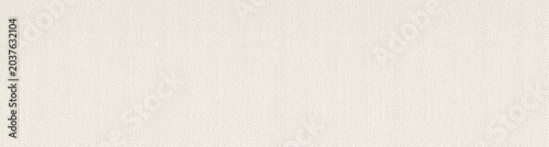 Photography Close up view of a seamless off-white woven fabric texture with a subtle herringbone pattern perfect for interior design backgrounds