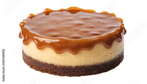 Caramel cheesecake isolated on white background highlighting creamy filling and glossy syrup topping