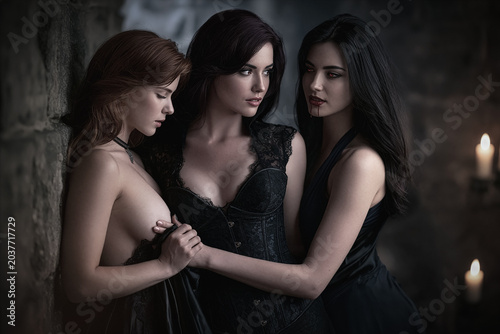 Female vampire with two women