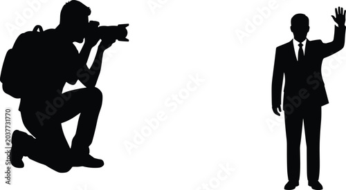 Konstfotografi Kneeling Photographer with Camera Photographing Politician or Businessman Waving