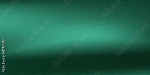 Fotografie An abstract background featuring a soft, dark green texture
