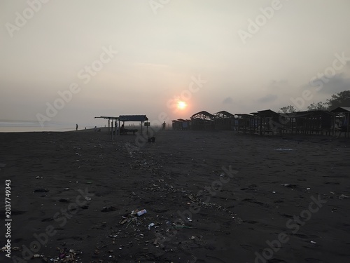 sunset on the black sandy beach