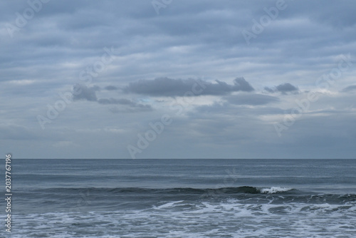 Cloudy morning sky and ocean