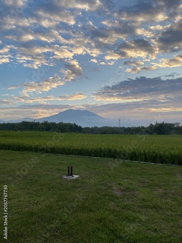 sunset and mountain views on the edge of the rice fields