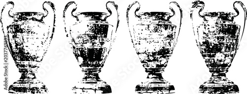 four classic vintage trophies with handles and worn texture in black and white silhouette