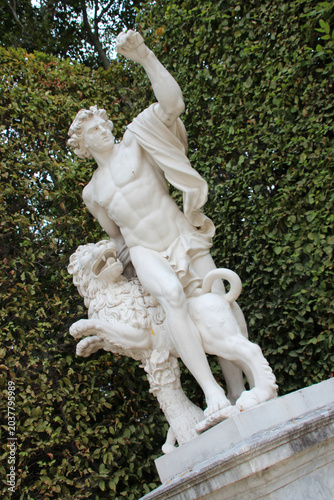 Photos allegorical statue (the hothead) in the gardens of the palace of versailles in f