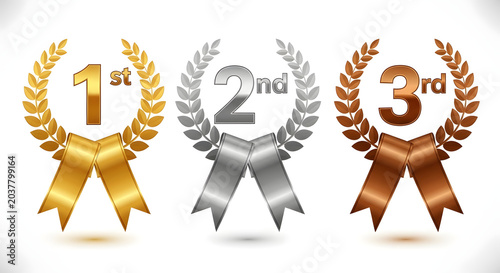 Gold silver and bronze award ribbons with laurel wreaths first second and third place recognition