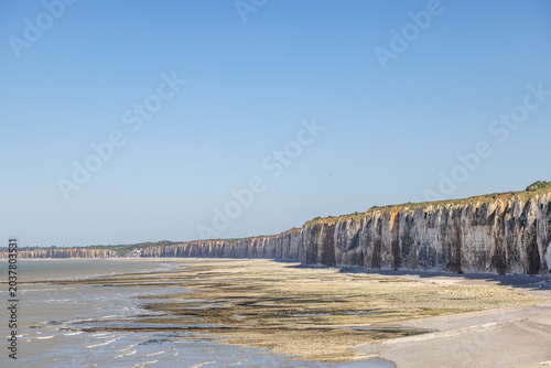 Panoramic View of the White Chalk Cliffs and Pebble Beach at Low Tide on the Alabaster Coast, Normandy