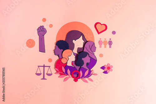 International Women's Day concept with diverse female profiles in paper cut art style. Women rights, feminism and gender equality background