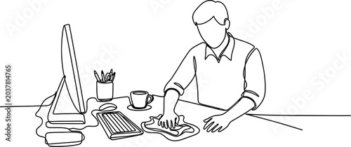 Tableau sur toile Man cleaning office desk with computer, keyboard, mouse, and coffee cup