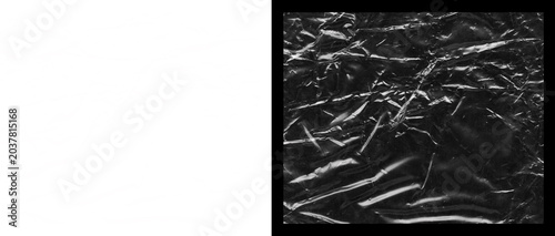 Konstfotografi Crumpled black plastic texture, wrinkled dark polyethylene film surface, shiny c
