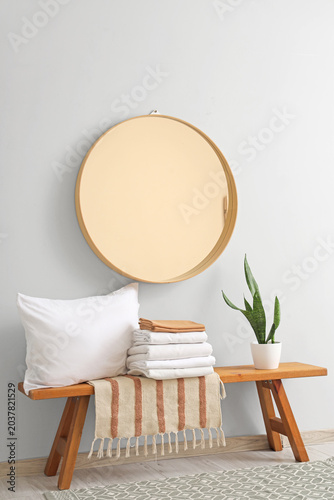 Bench with bed sheets, plan...
