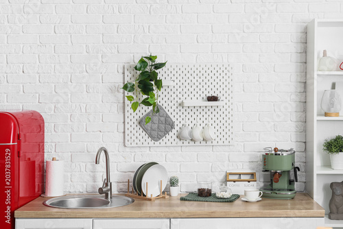 Interior of light kitchen w...