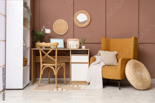 Stylish workplace with mode...