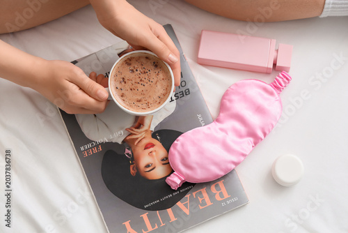 Young woman with cup of cof...