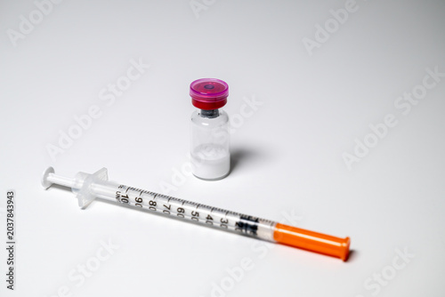 Peptides and syringe. Peptides are amino acids that are used in a myriad of medical ways from glucose control to battling inflammation.