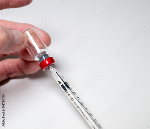 Peptides and syringe. Peptides are amino acids that are used in a myriad of medical ways from glucose control to battling inflammation.
