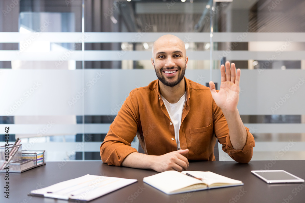 Fototapeta premium Successful businessman greeting during online video conference