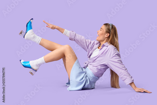 Young woman in stylish shoe...
