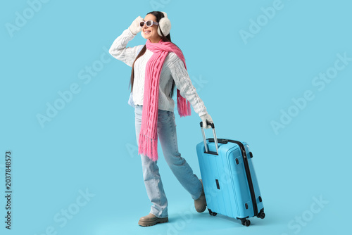 Young female tourist in win...