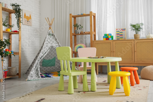 Interior of stylish playroo...