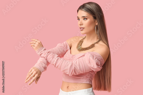 Stylish young woman in beau...