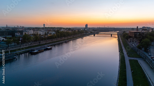 Aerial view of the Vistula River and the city of Krakow at dawn in spring