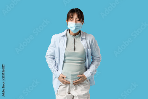 Pregnant Asian woman in med...