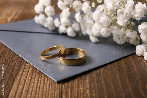 Wedding ring, envelope and ...