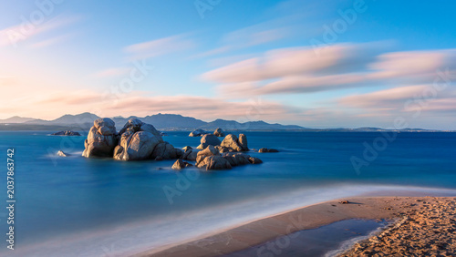 Foto A beach in the sunset