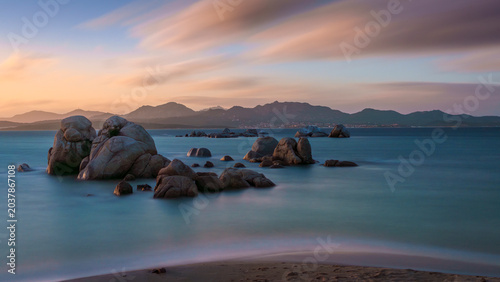 A beach in the sunset
