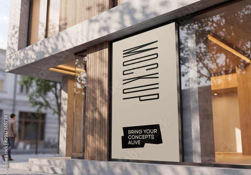 Vertical outdoor large billboard mockup mounted on the window glass facade of a modern concrete and wooden building store entrance with a person walking in the background