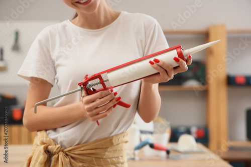Young woman with sealant du...