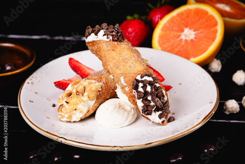 Cannoli with berries and cream