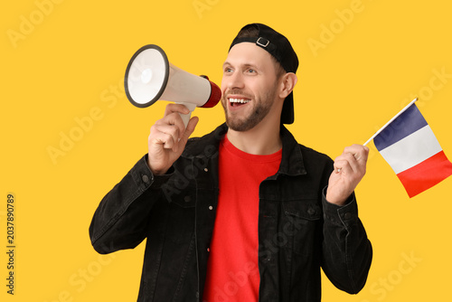Young man with flag of Fran...