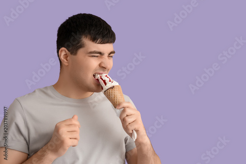 Young man with ice cream su...