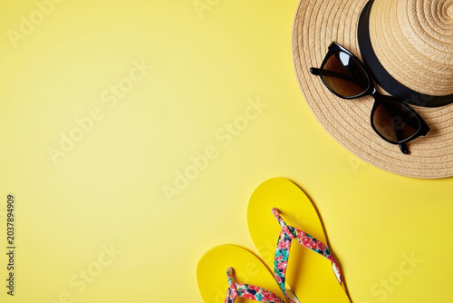 Summer travel essentials flat lay. Vacation items minimal composition. Bright travel accessories concept. Holiday preparation background. Tourism objects top view