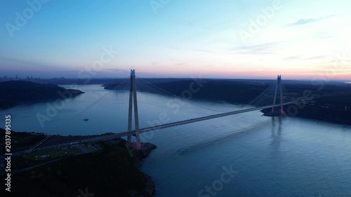 Yavuz Sultan Selim Bridge in Istanbul, Turkey. Aerial view at sunset with drone. Colorful bridge and weather.