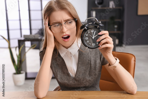 Shocked young businesswoman...