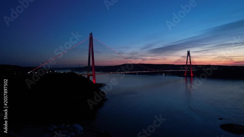 Yavuz Sultan Selim Bridge in Istanbul, Turkey. Aerial view at sunset with drone. Colorful bridge and weather.